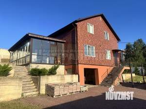 Коттедж 233м², 3-этажный, участок 10 сот.  